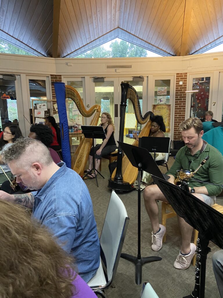 Harp and saxophone at rehearsal